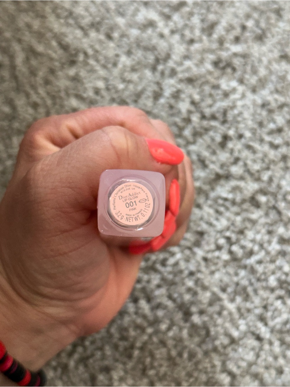 Handheld cosmetic tube
